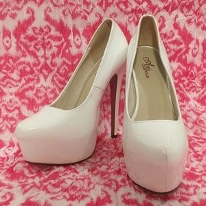 White patent leather stilettos heels. Ami Clubwear
